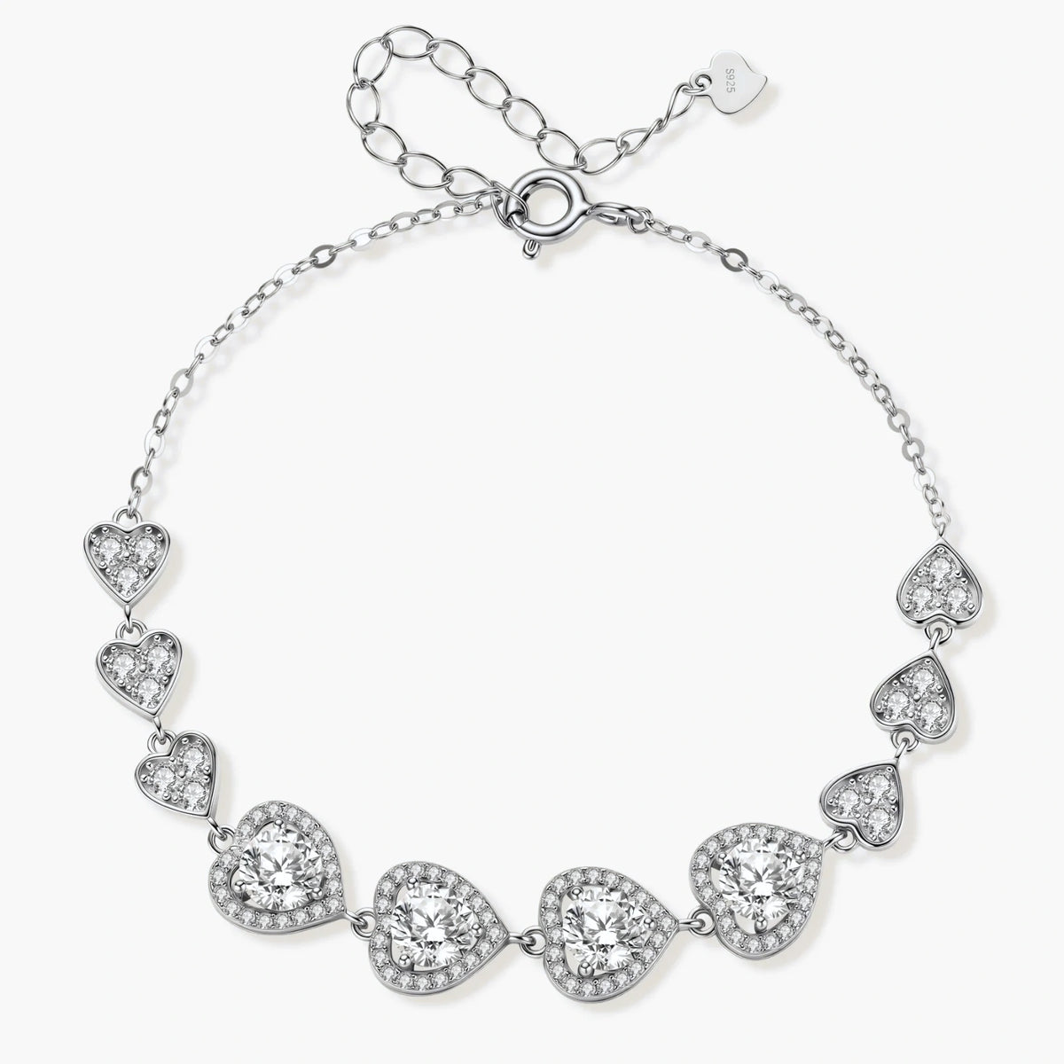 Sterling silver bracelet with graduated heart-shaped links and sparkling moissanite stones in VVS1 clarity on white background.