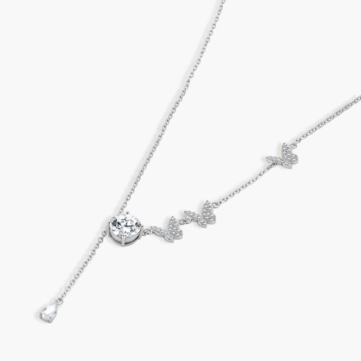 Sterling silver Y-shaped necklace with butterfly charms and brilliant moissanite stone with teardrop pendant