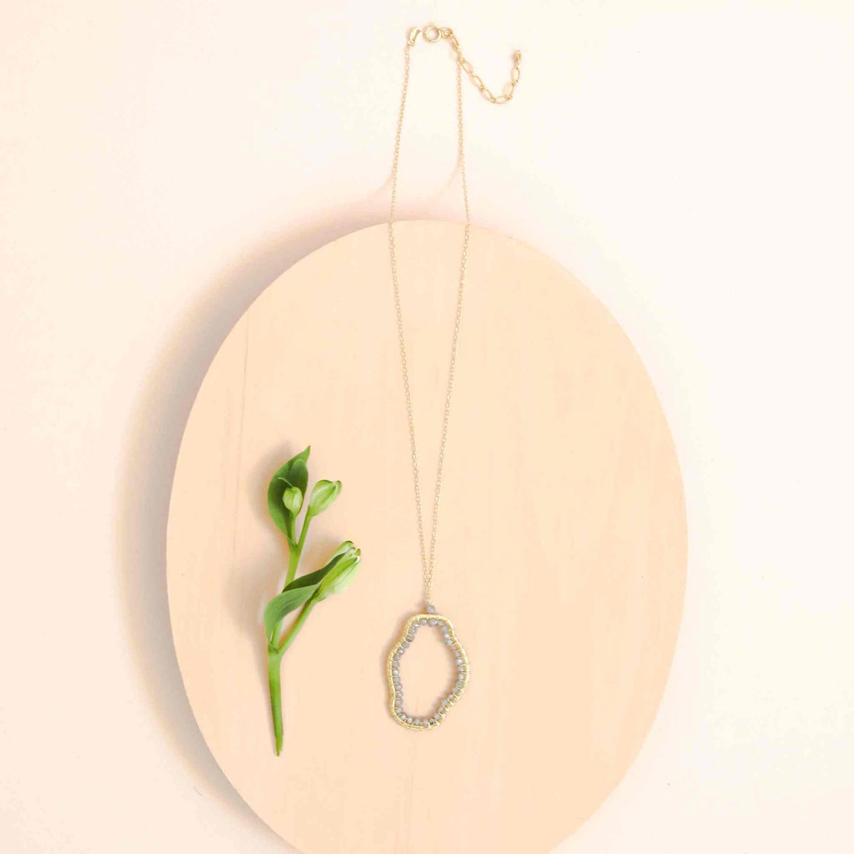 Labradorite Freestyle Jewelry SetCompletely one-of-a-kind, Labradorite gold pendant and earrings set. Each one is a unique, amorphous shape.
Floating pendant is strung on a very delicate chain that Necklace/Earring KitPARKEN JEWELRYVettedArcLabradorite Freestyle Jewelry Set