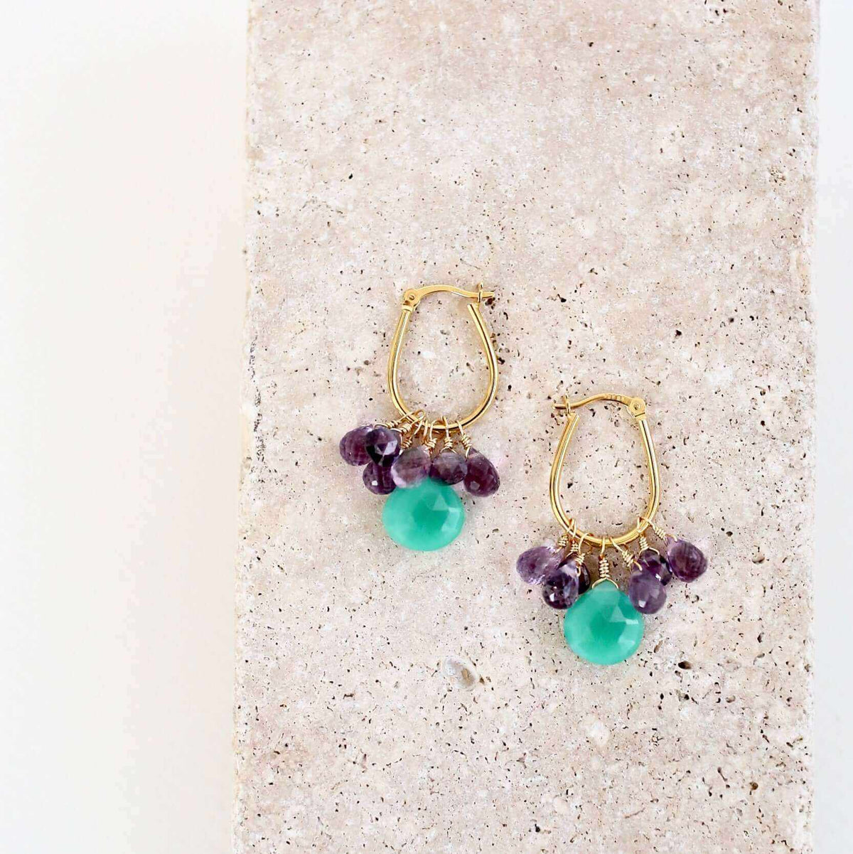 Chrysoprase & Amethyst Gold EarringsWe loved the bright sea green color of chrysoprase gemstones the minute we set eyes on them. Paired with sparkling amethyst, and so lightweight you&