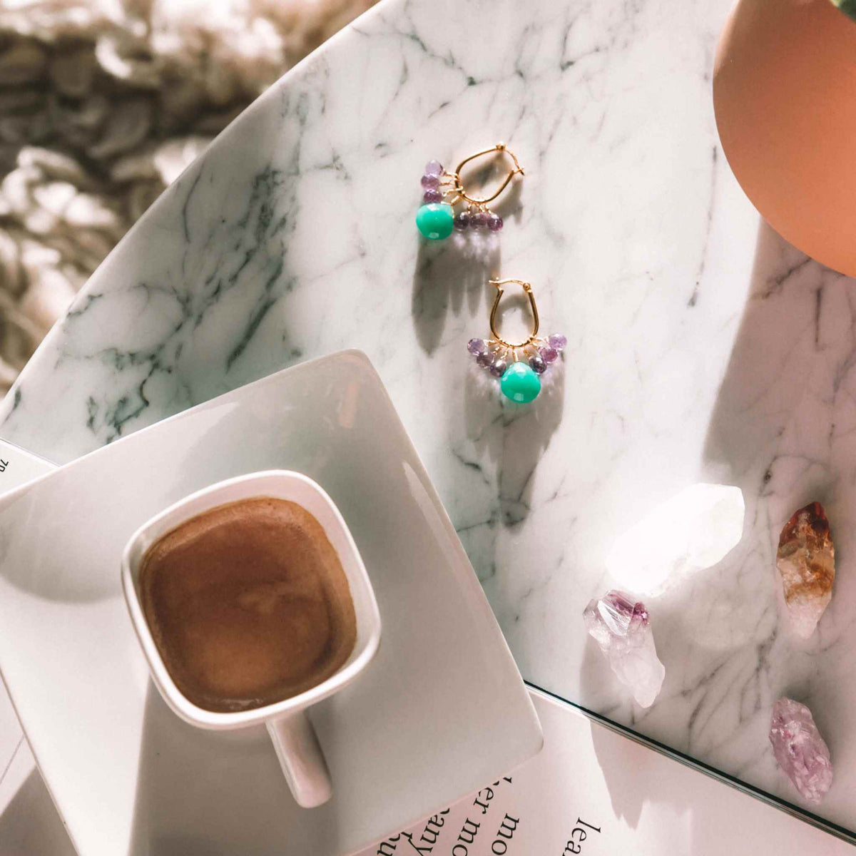Chrysoprase & Amethyst Gold EarringsWe loved the bright sea green color of chrysoprase gemstones the minute we set eyes on them. Paired with sparkling amethyst, and so lightweight you&