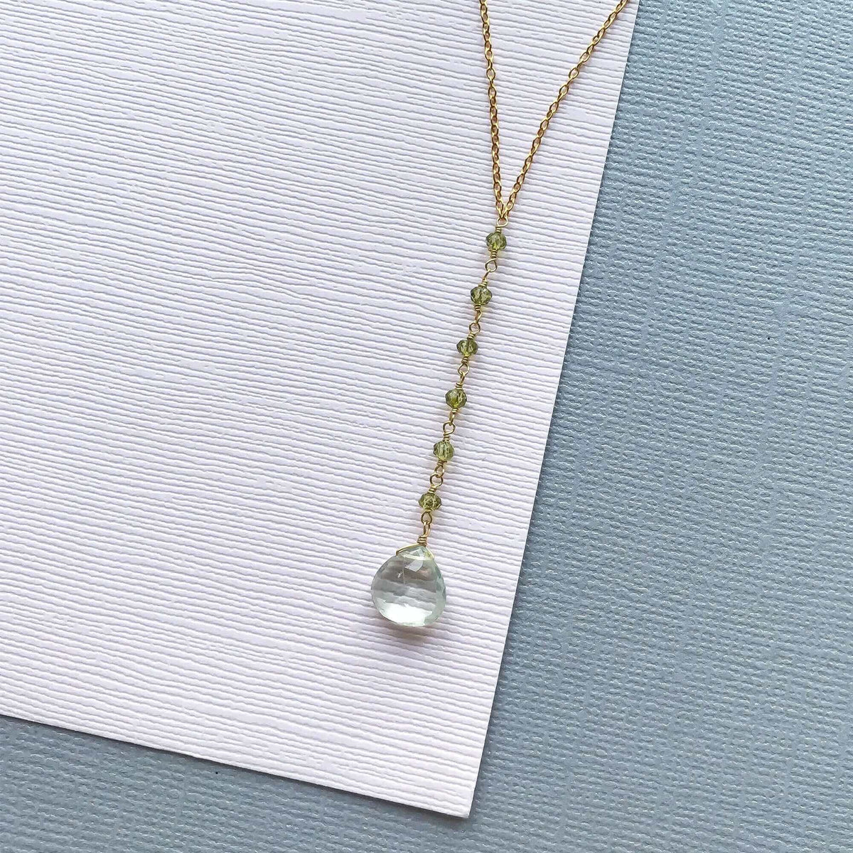 Green Amethyst Mini Yoga PendantYoga pendant necklace with a green amethyst (a.k.a. prasiolite) gemstone and peridot accent stones- 18-20" long with a 2" extender chain- Pendant drop is 2" long- 1NecklacesPARKEN JEWELRYVettedArcGreen Amethyst Mini Yoga Pendant