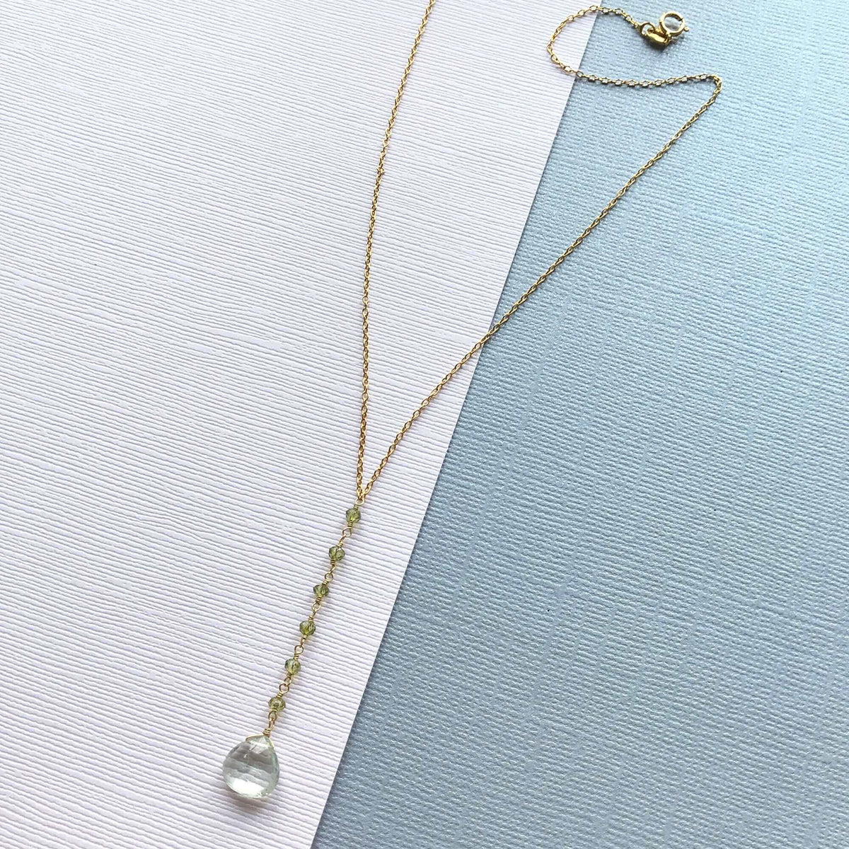 Green Amethyst Mini Yoga PendantYoga pendant necklace with a green amethyst (a.k.a. prasiolite) gemstone and peridot accent stones- 18-20" long with a 2" extender chain- Pendant drop is 2" long- 1NecklacesPARKEN JEWELRYVettedArcGreen Amethyst Mini Yoga Pendant