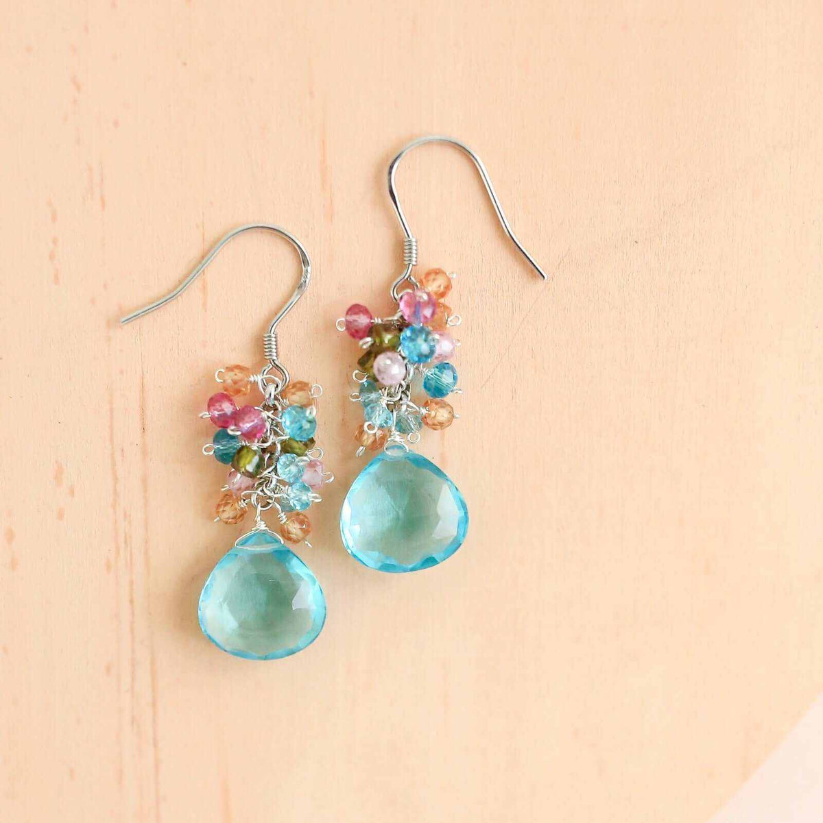 Peridot Quartz Bala EarringsStunning drops of color. Gold drop earrings made with peridot quartz topped with a rainbow cluster of gems.
- French hooks- 1.25" long- 14k gold plated .925 fine ItaEarringsPARKEN JEWELRYVettedArcPeridot Quartz