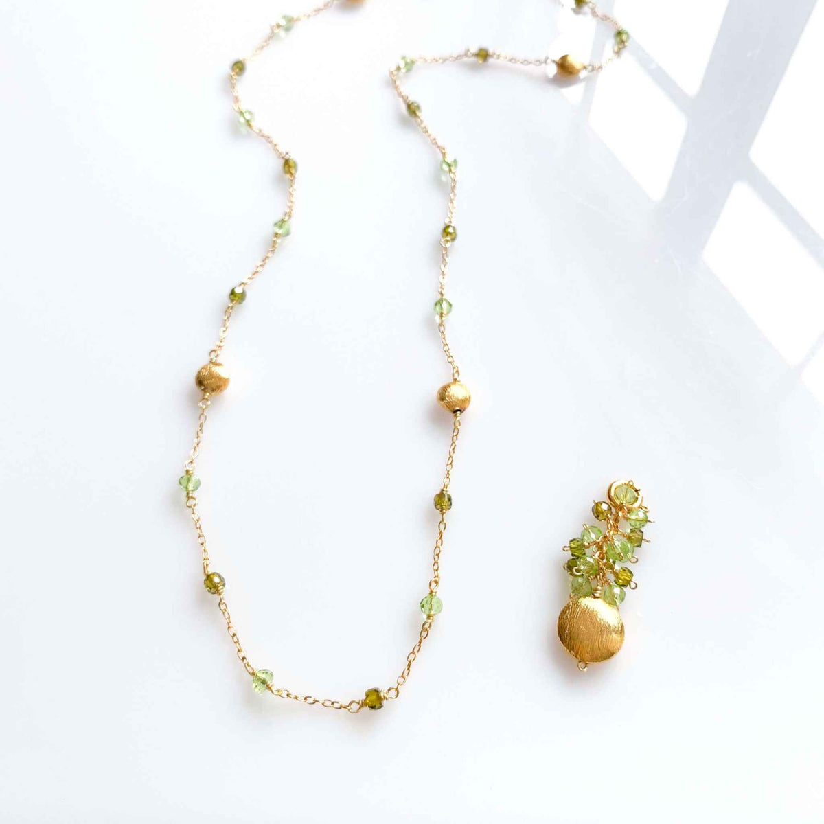 Long Peridot & Green Amethyst Beaded ChainGet gorgeous sparkle from this long convertible gemstone necklace. Made with Peridot and Green Amethyst Gemstones. Necklace can be worn multiple ways. Detach the gemNecklacesPARKEN JEWELRYVettedArcLong Peridot & Green Amethyst Beaded Chain