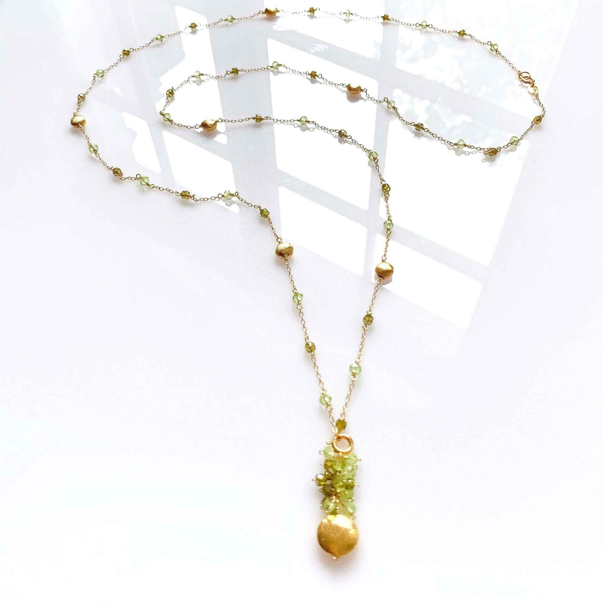 Long Peridot & Green Amethyst Beaded ChainGet gorgeous sparkle from this long convertible gemstone necklace. Made with Peridot and Green Amethyst Gemstones. Necklace can be worn multiple ways. Detach the gemNecklacesPARKEN JEWELRYVettedArcLong Peridot & Green Amethyst Beaded Chain