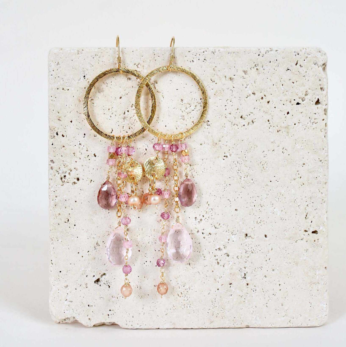 Amethyst & Citrine Ammil EarringsMultiple strands of lush gems sparkle on a 1" hoop.
- Amethyst and Citrine gemstones- 3.5" long- French hooks- 14k gold plated .925 fine Italian sterling silver- MadEarringsPARKEN JEWELRYVettedArcAmethyst & Citrine Ammil Earrings