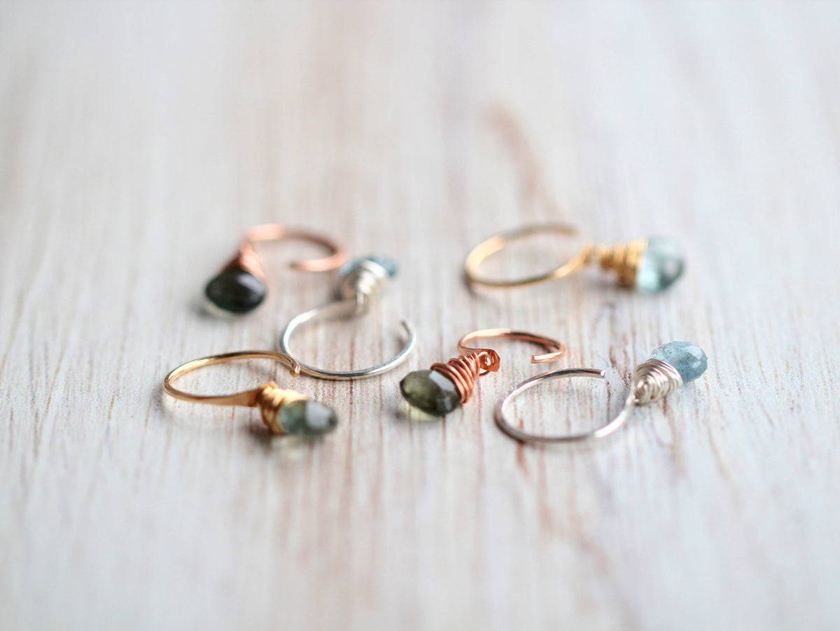 Moss aquamarine dangle huggie earrings with faceted green-blue gemstone drops