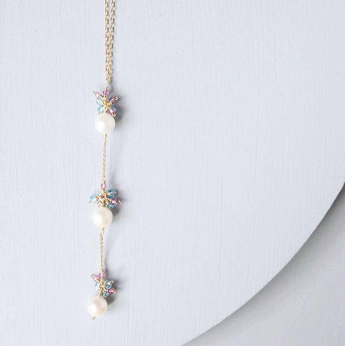 Pearl and Aquamarine Quartz NecklaceY design with 3 white freshwater bead pearls paired with genuine aquamarine quartz gemstones.
Handmade necklace is 18" long with a 2" extender (up to 20") and 14k gNecklacesPARKEN JEWELRYVettedArcPearl And Aquamarine Quartz Necklace