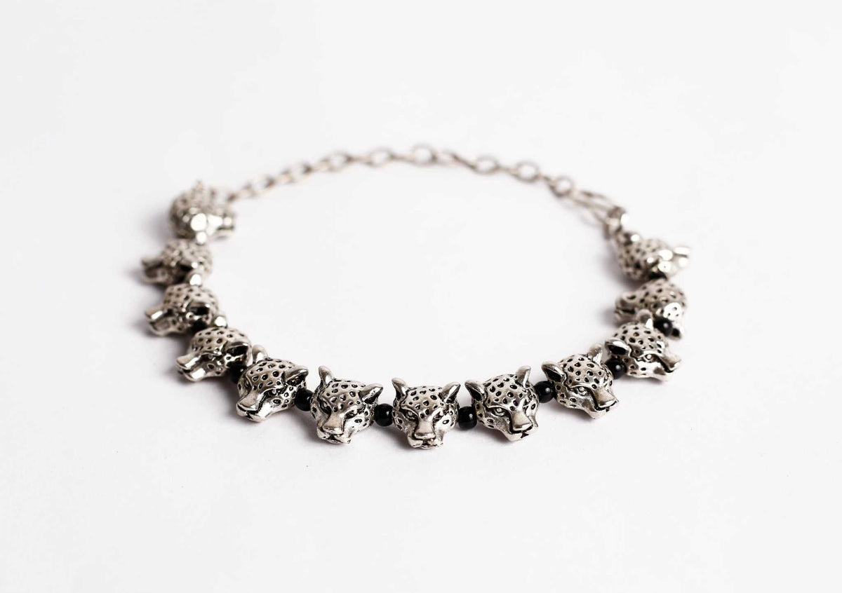 collection of bracelets and anklets for stacking or solo wear