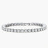 Sterling silver tennis bracelet with continuous row of brilliant moissanite stones and secure clasp closure on cream background.