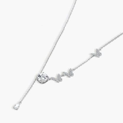 Sterling silver Y-shaped necklace with butterfly charms and brilliant moissanite stone with teardrop pendant