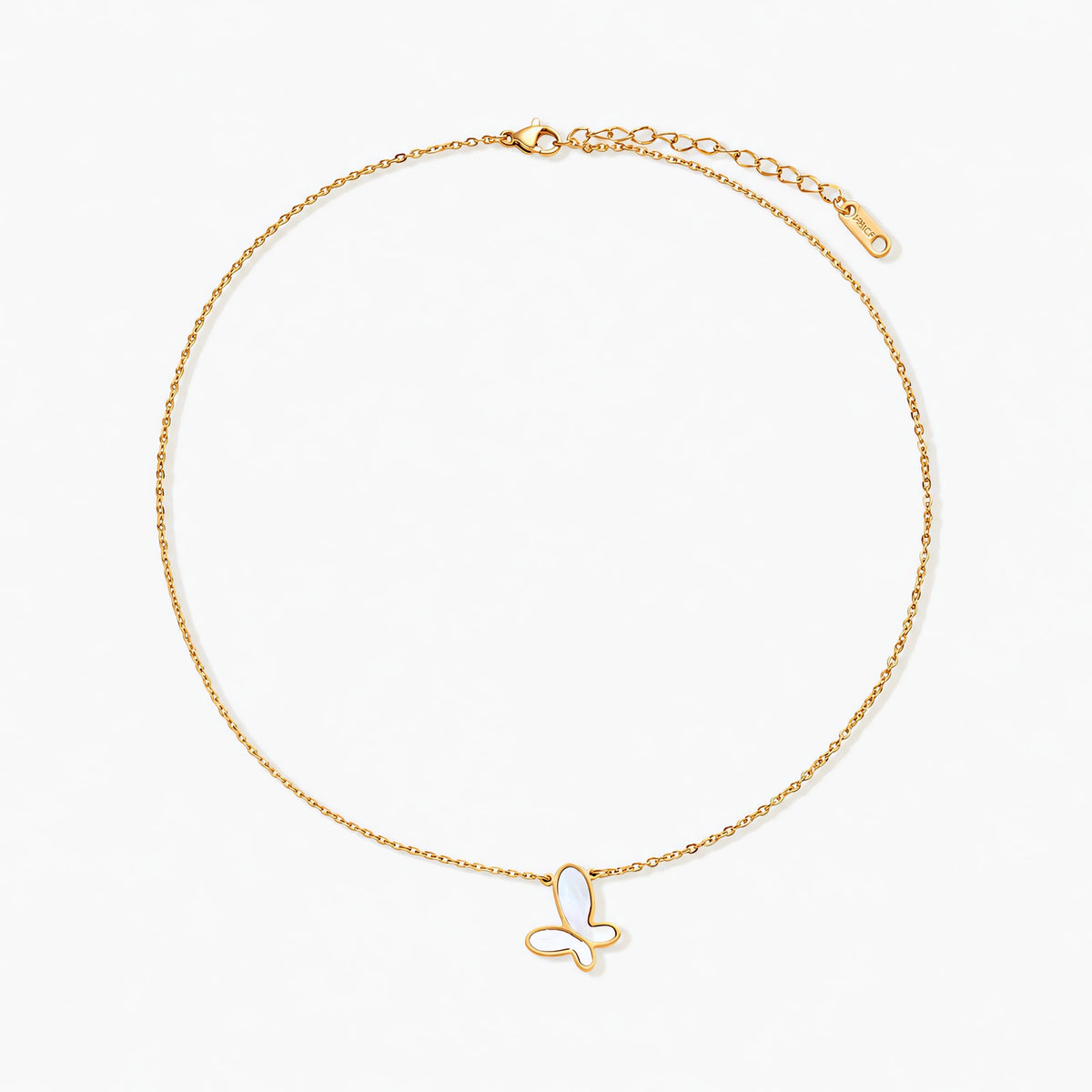 Gold-plated butterfly pendant with iridescent mother of pearl inlay on delicate chain against cream background.