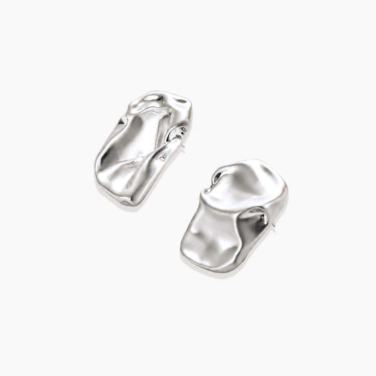Modern textured hoop earrings and layered chain necklace with liquid metal pendant in silver and gold finishes.