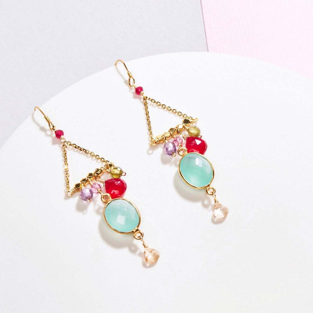 Rainbow Chandie EarringsOur "chandies" are a modern take on classic chandelier earrings, using gemstone color combos and varying stone shapes and sizes. This pair features bezel set blue chEarringsPARKEN JEWELRYVettedArcRainbow Chandie Earrings