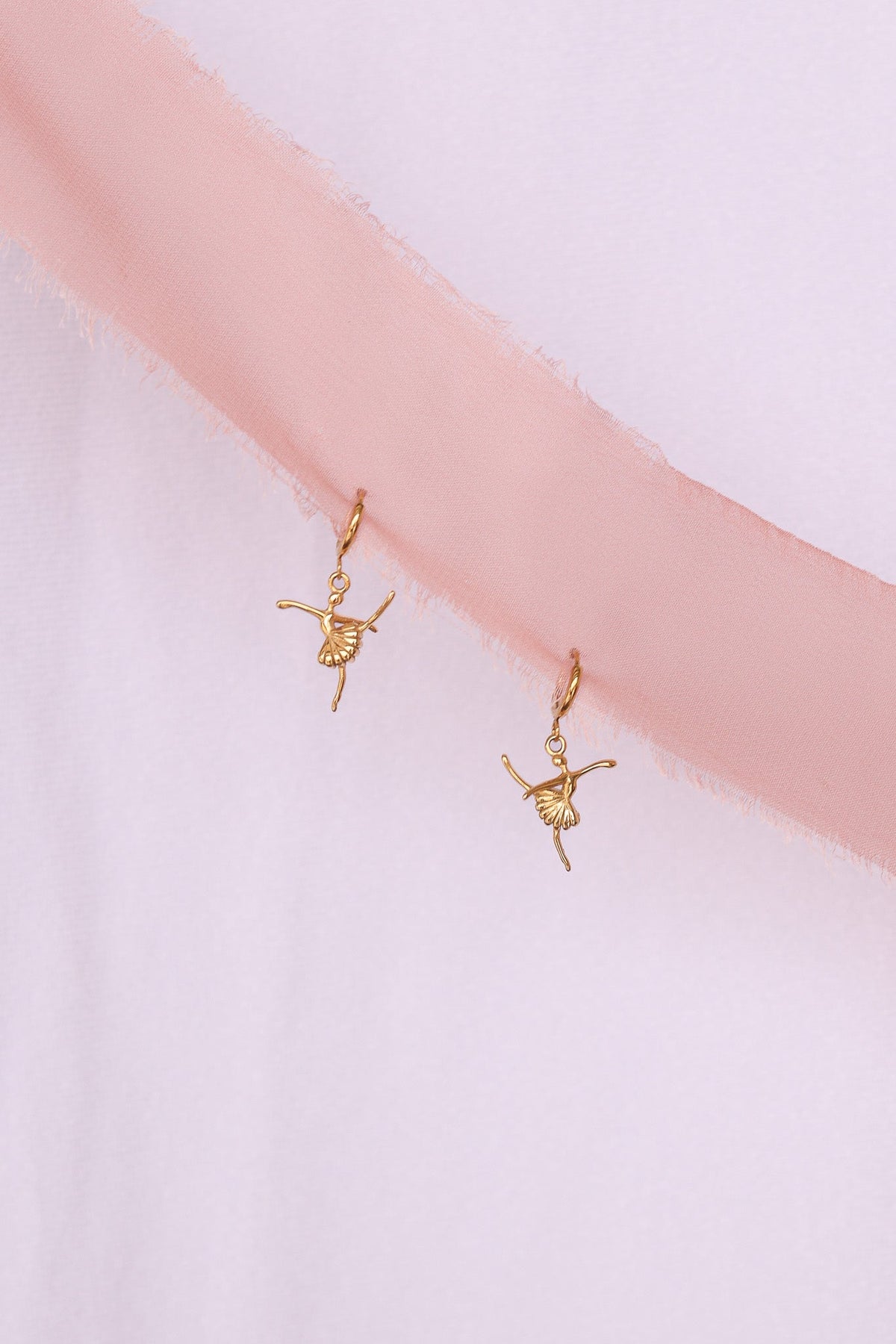 Tiny Dancer Huggie Hoop