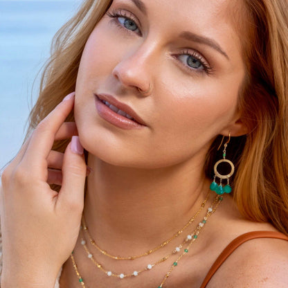Green Onyx Mini Boho EarringsInspired by dream catchers, these boho minis are ready-to-wear with anything. 
- Green Onyx gemstones- 1.5" long- French Hooks- 14k gold plated over .925 Italian finEarringsPARKEN JEWELRYVettedArcGreen Onyx Mini Boho Earrings