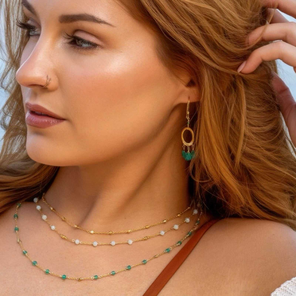 Green Onyx Mini Boho EarringsInspired by dream catchers, these boho minis are ready-to-wear with anything. 
- Green Onyx gemstones- 1.5" long- French Hooks- 14k gold plated over .925 Italian finEarringsPARKEN JEWELRYVettedArcGreen Onyx Mini Boho Earrings