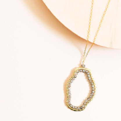 Labradorite Freestyle Jewelry SetCompletely one-of-a-kind, Labradorite gold pendant and earrings set. Each one is a unique, amorphous shape.
Floating pendant is strung on a very delicate chain that Necklace/Earring KitPARKEN JEWELRYVettedArcLabradorite Freestyle Jewelry Set