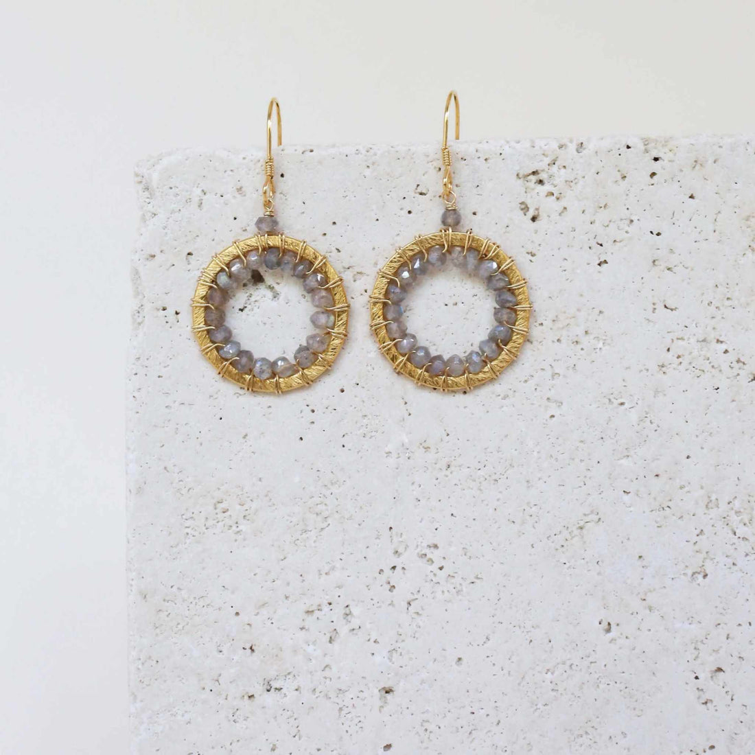 Labradorite Mini Halo EarringsThe Halo collection was our very first one. Intended to symbolize the intricate, universal energy woven within us all. These small, sparkling labradorite earrings arEarringsPARKEN JEWELRYVettedArcLabradorite Mini Halo Earrings