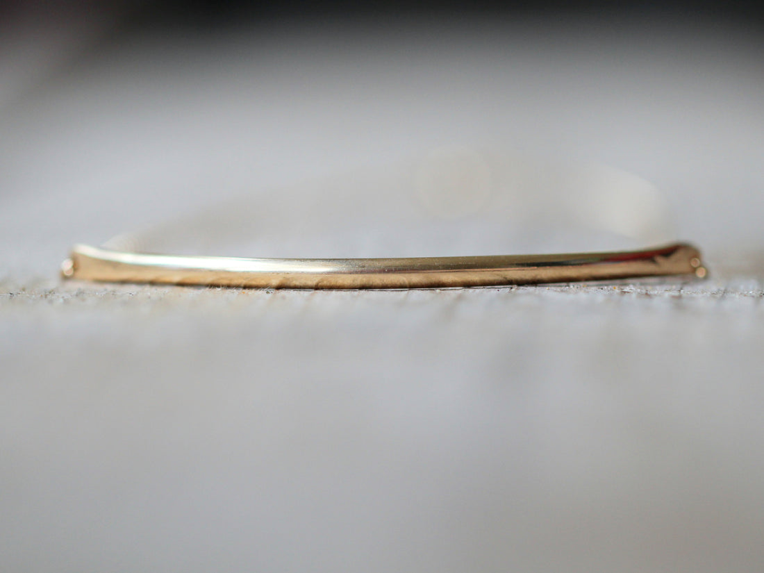 Modern bar choker necklace with a sleek horizontal bar pendant on a delicate chain