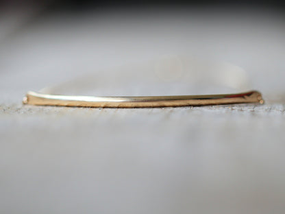 Modern bar choker necklace with a sleek horizontal bar pendant on a delicate chain