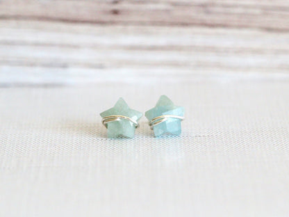 Pair of aquamarine stud earrings with celestial star accents