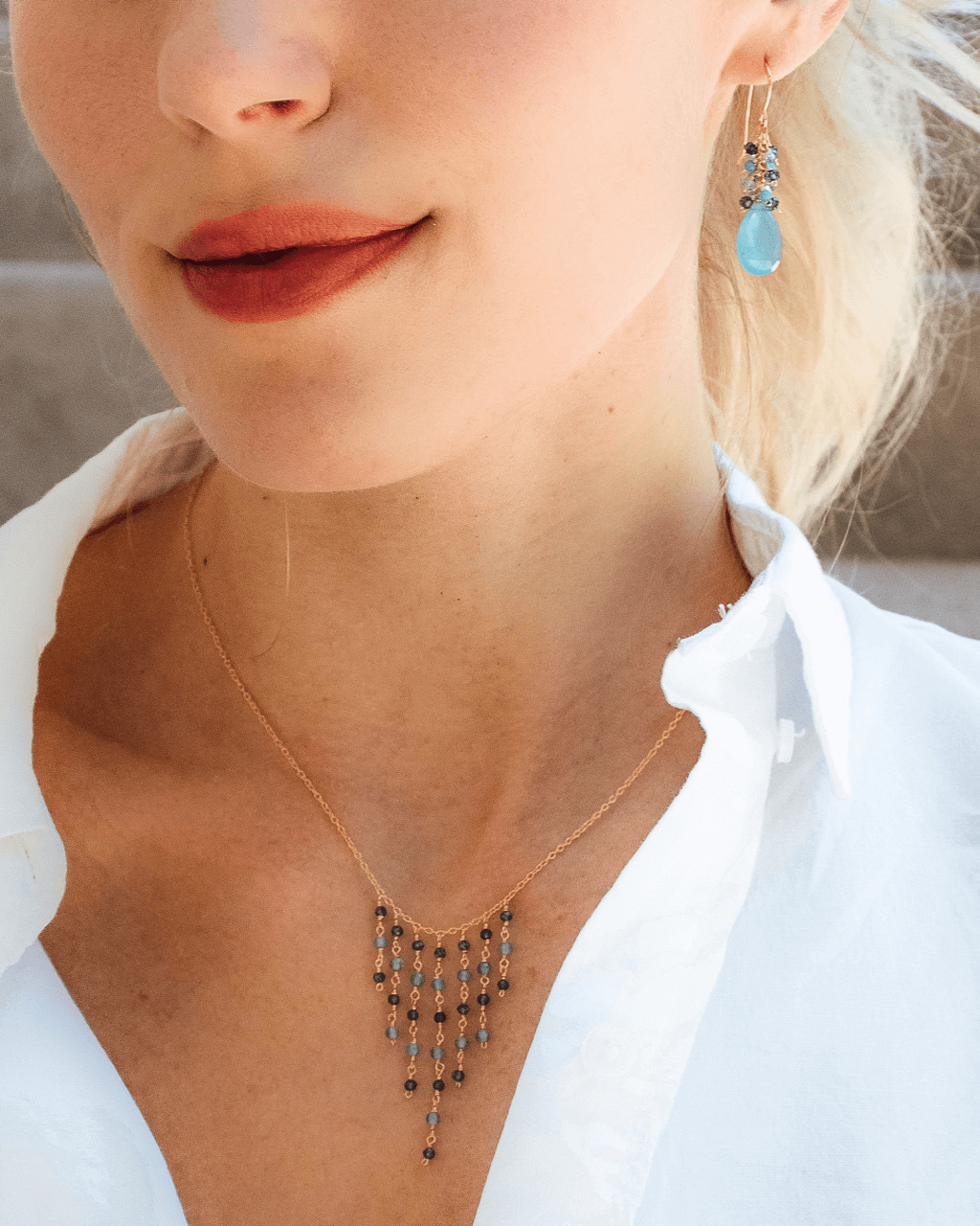 Blue Gemstone Fringe Necklace &amp; Earring SetWe paired our delicate gemstone fringe necklace with a beautiful gemstone cluster earring.
Fringe Necklace is made with Iolite and Blue Apatite gemstones- 16-18" lonNecklace/Earring KitPARKEN JEWELRYVettedArcBlue Gemstone Fringe Necklace