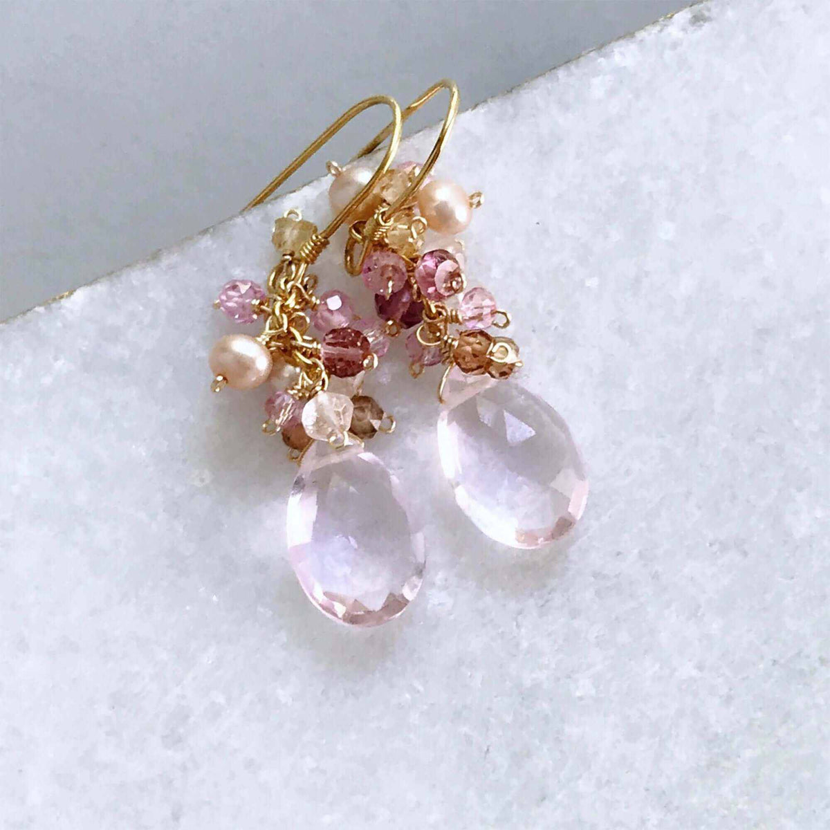 Peridot Quartz Bala EarringsStunning drops of color. Gold drop earrings made with peridot quartz topped with a rainbow cluster of gems.
- French hooks- 1.25" long- 14k gold plated .925 fine ItaEarringsPARKEN JEWELRYVettedArcPeridot Quartz