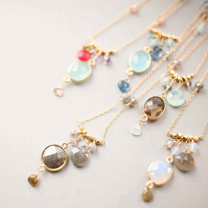 Aqua chalcedony rainbow bezel necklace with gold chain and multicolor gemstone accents