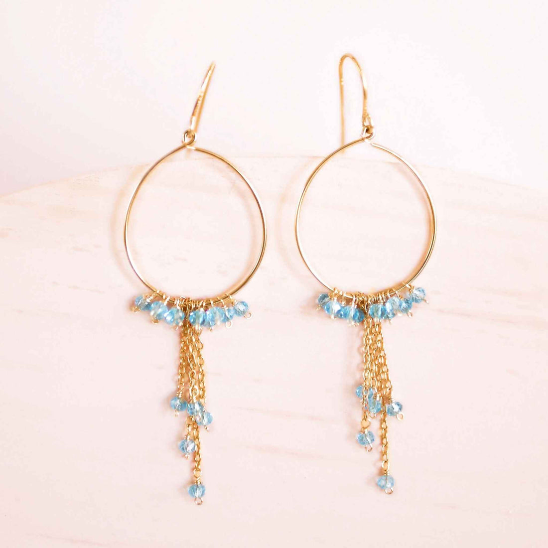Aquamarine mini swing hoop earrings with delicate gemstone chains on gold plated sterling silver hoops