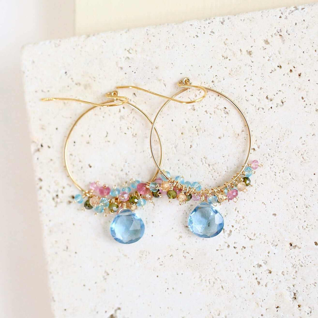 Aquamarine quartz swing earrings in gold vermeil with delicate motion and vibrant aqua blue gemstones