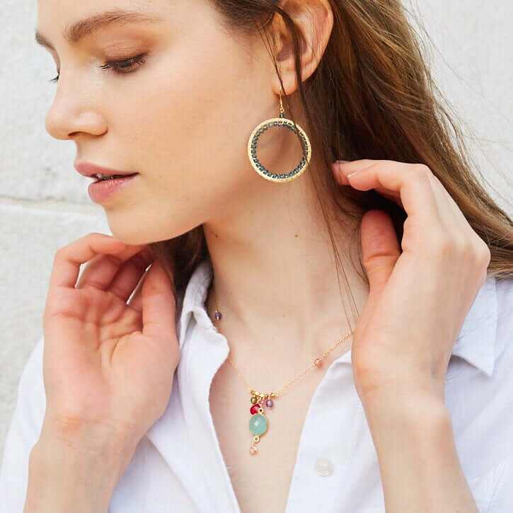 Delicate gold bezel necklaces with five gemstone options on fine Italian sterling silver chains