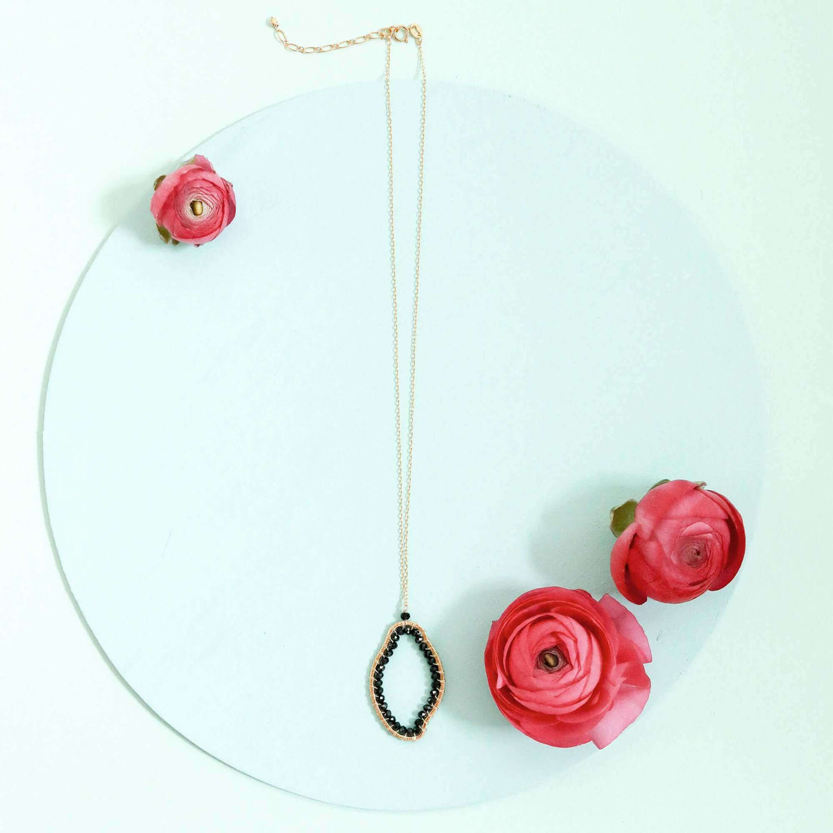 Black Spinel freestyle pendant necklace in 14k gold plated sterling silver on delicate adjustable chain