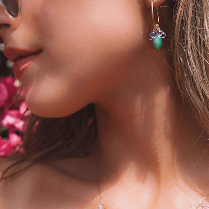 Chrysoprase &amp; Amethyst Gold EarringsWe loved the bright sea green color of chrysoprase gemstones the minute we set eyes on them. Paired with sparkling amethyst, and so lightweight you&