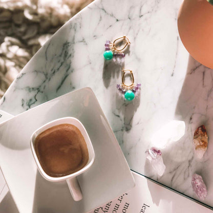Chrysoprase &amp; Amethyst Gold EarringsWe loved the bright sea green color of chrysoprase gemstones the minute we set eyes on them. Paired with sparkling amethyst, and so lightweight you&