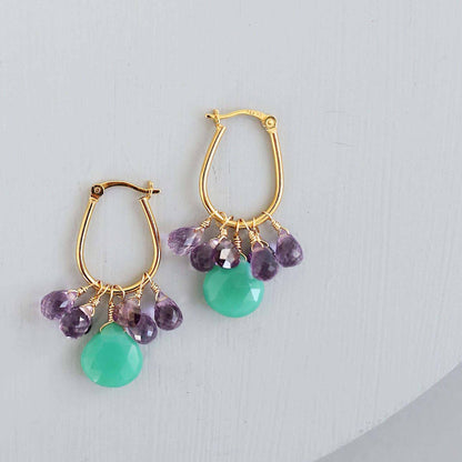 Chrysoprase &amp; Amethyst Gold EarringsWe loved the bright sea green color of chrysoprase gemstones the minute we set eyes on them. Paired with sparkling amethyst, and so lightweight you&