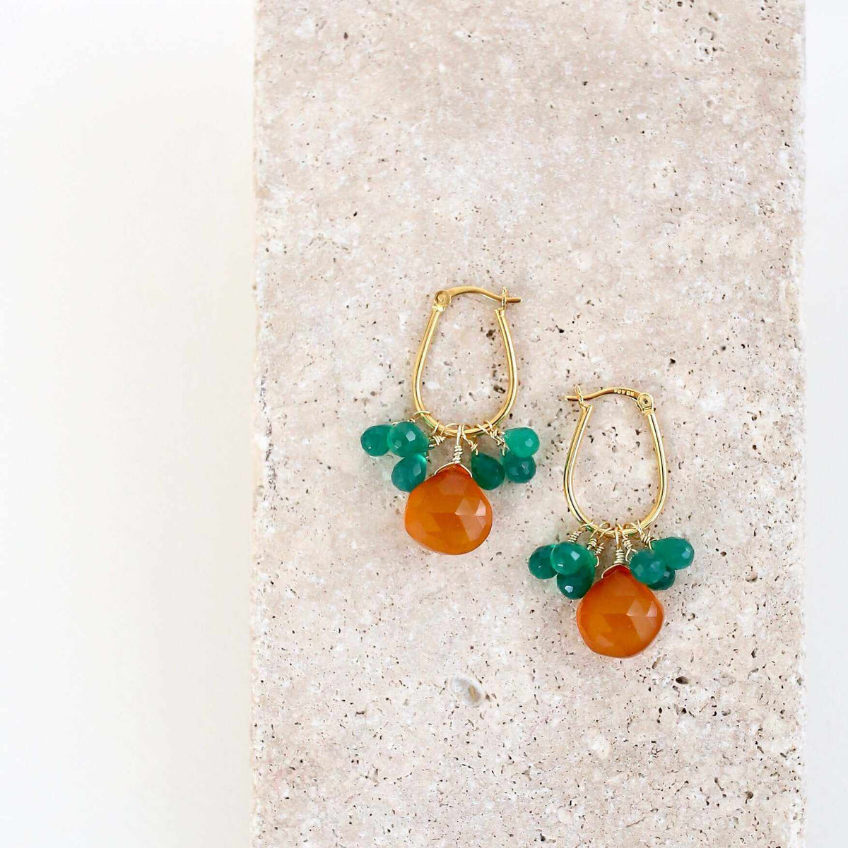 Dark Orange Chalcedony &amp; Green Onyx Gold EarringsSmall but mighty rich color. Beautiful dark orange chalcedony paired with green onyx briolettes.
- 1.5 inches long- Latch backs- 14k gold plated .925 fine Italian stEarringsPARKEN JEWELRYVettedArcDark Orange Chalcedony