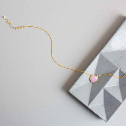 Pink Rose Quartz Pendant NecklaceAn oh-so-pretty pink rose quartz heart bezel floats on this delicate gold layering chain.
Handmade with tarnish resistant 14k gold plated over fine Italian .925 silvNecklacesPARKEN JEWELRYVettedArcPink Rose Quartz