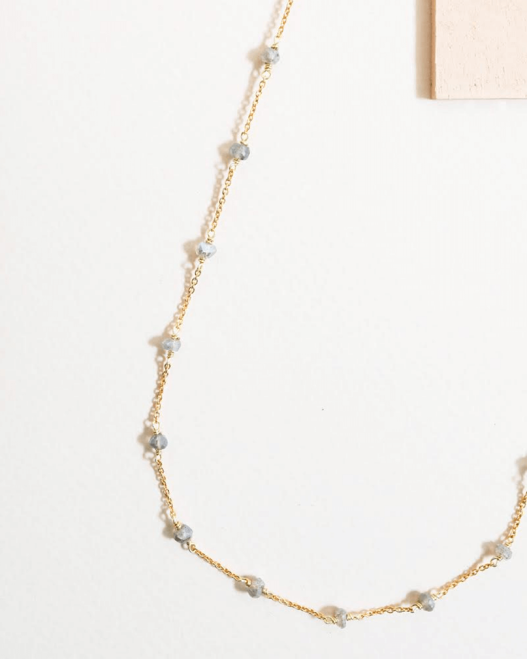 Labradorite Necklace &amp; Earring Layering SetOur gorgeous raindrop earrings made with a "flash" labradorite gemstone and paired with a delicate &