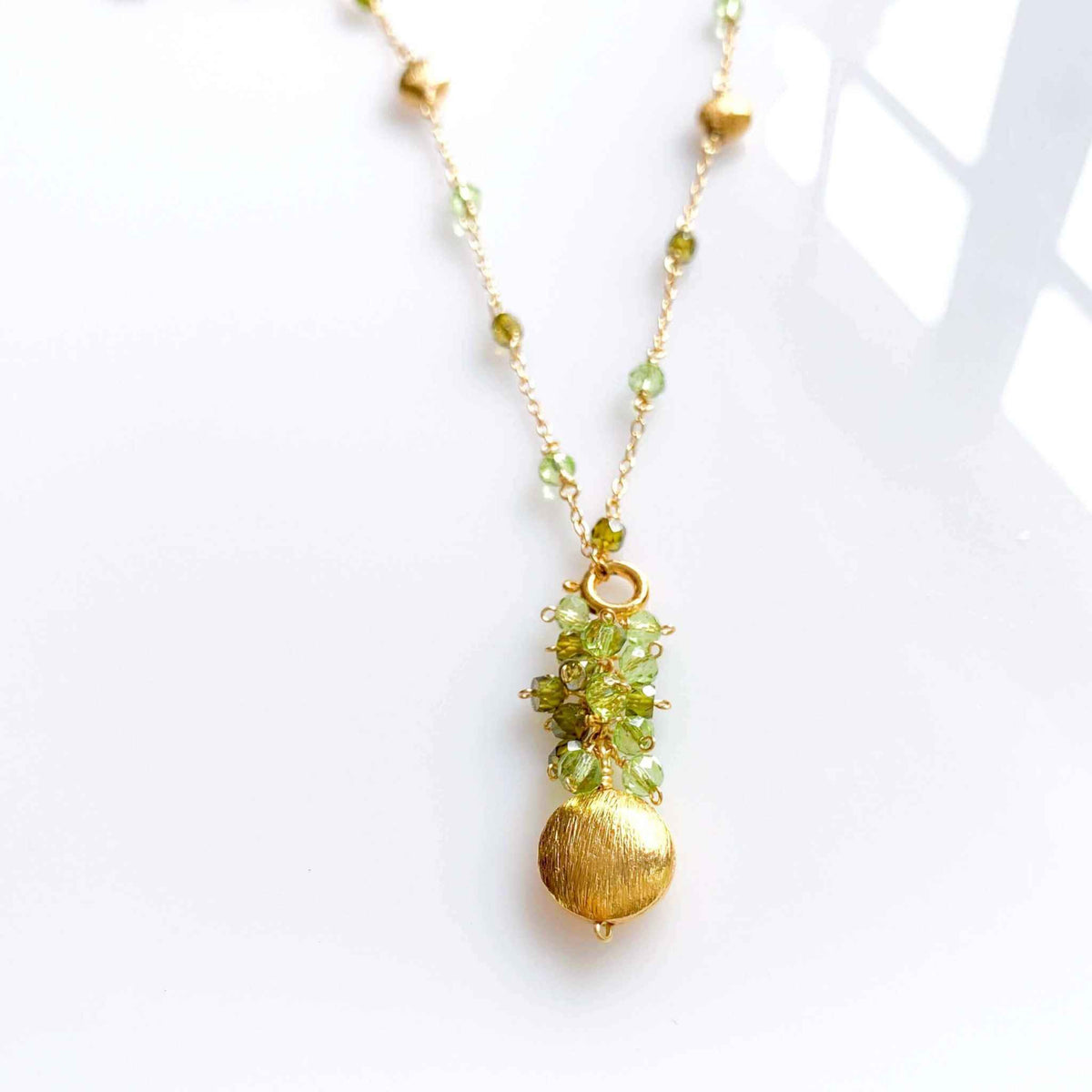 Long Peridot &amp; Green Amethyst Beaded ChainGet gorgeous sparkle from this long convertible gemstone necklace. Made with Peridot and Green Amethyst Gemstones. Necklace can be worn multiple ways. Detach the gemNecklacesPARKEN JEWELRYVettedArcLong Peridot &amp; Green Amethyst Beaded Chain