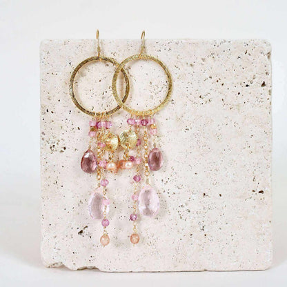 Rose Pink Gemstones Ammil EarringsMultiple strands of lush gems sparkle on a 1" hoop.
- Pink Clear Quartz and Pink Tourmaline gemstones- 3.5" long- French hooks- 14k gold plated .925 fine Italian steEarringsPARKEN JEWELRYVettedArcRose Pink Gemstones