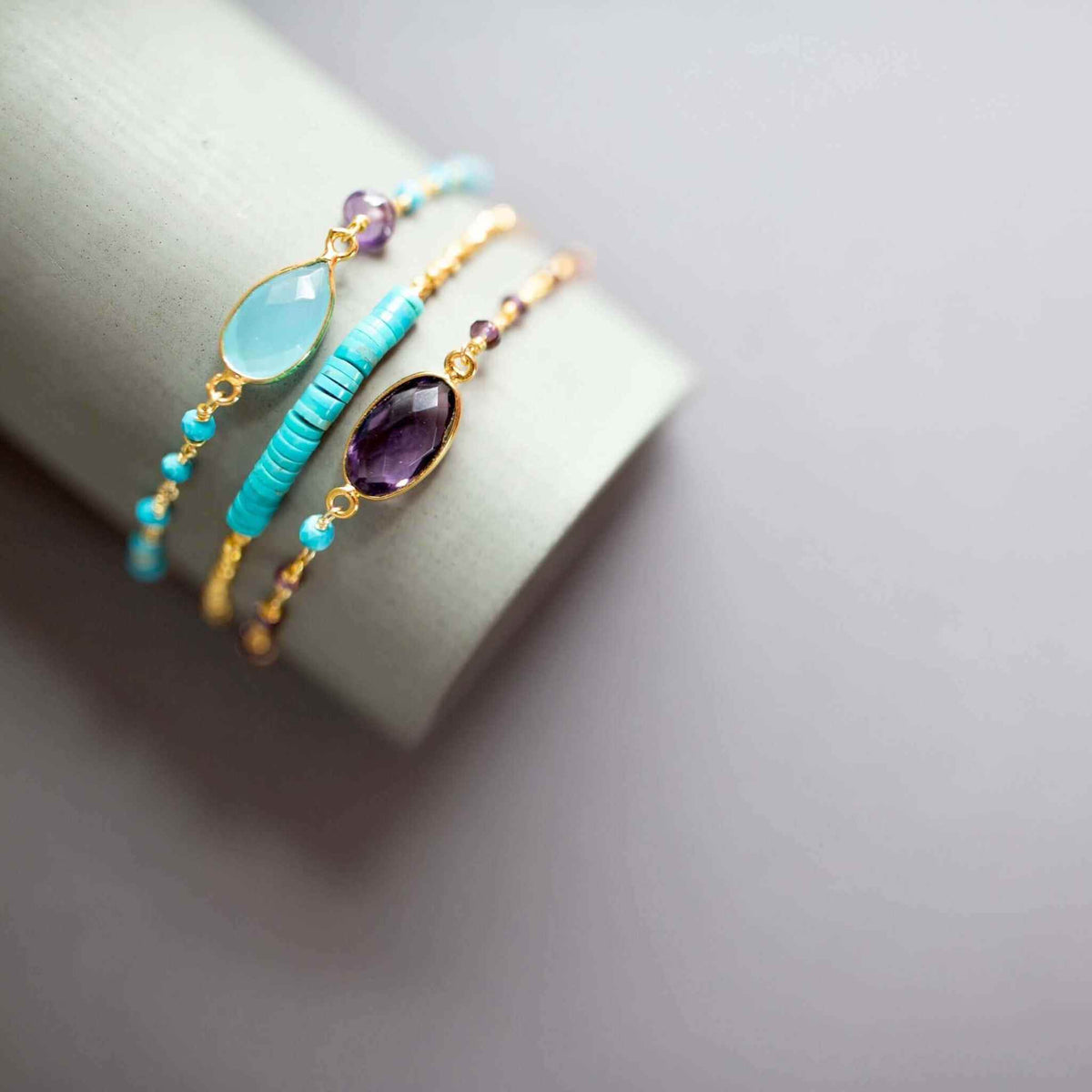 Bracelet Set: Amethyst, Blue Chalcedony and TurquoiseOur easy stacking bracelet sets are completely adjustable so they fit everyone. Made with sparkling bezel gemstones and tiny stone accents. This combo of blue and puBracelet SetPARKEN JEWELRYVettedArcBracelet Set
