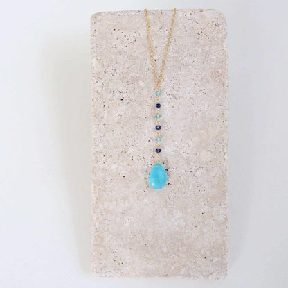 Blue Chalcedony Yoga PendantYoga pendants are designed for total simplicity.
- Blue Chalcedony gemstones paired with shades of blue gemstone accent stones- 18-20" long with a 2" extender chain-NecklacesPARKEN JEWELRYVettedArcBlue Chalcedony Yoga Pendant