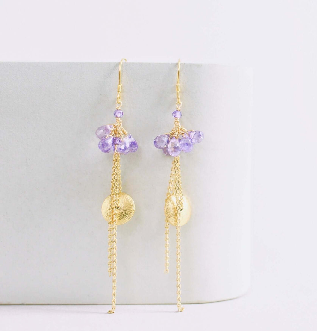 Amethyst En Pointe EarringsInspired by ballerinas, all of the earrings in this collection are gracefully designed to "dance" with the light.
- Amethyst briolette gemstones- 3" long
- French hoEarringsPARKEN JEWELRYVettedArcAmethyst En Pointe Earrings