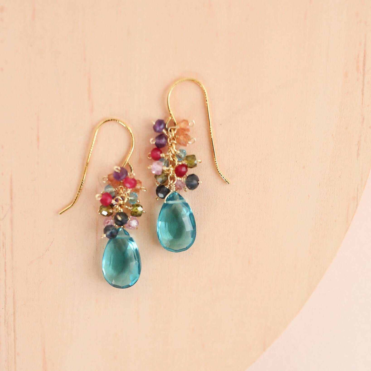 Bala EarringsStunning drops of color. Gold drop earrings made with stunning, colorful stones topped with a rainbow cluster of gems.
- 1.25" long- French hooks- 14k gold plated .9EarringsPARKEN JEWELRYVettedArcBala Earrings