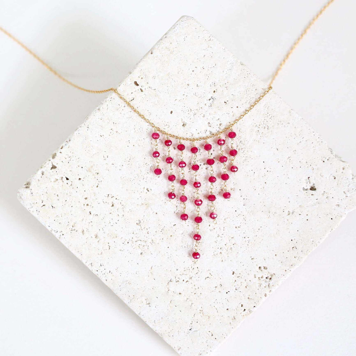 Ruby Red Quartz Mini Fringe NecklaceThese super delicate necklaces are our unique gemstone version of fringe jewelry.
- Ruby Quartz gemstones- 17-19" long with a 2" extender chain- Spring ring clasp- 1NecklacesPARKEN JEWELRYVettedArcRuby Red Quartz