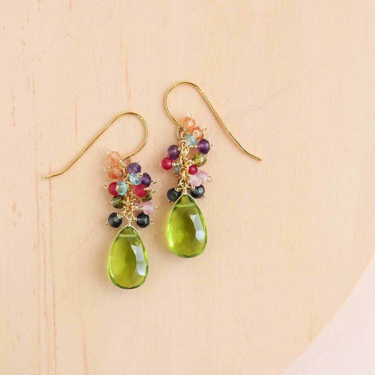 White Chalcedony Bala EarringsShimmering white stones topped with a rainbow cluster of gems.
- 1.25" long- French hooks- 14k gold plated .925 fine Italian sterling silver- Made in the USA in our EarringsPARKEN JEWELRYVettedArcWhite Chalcedony Bala Earrings