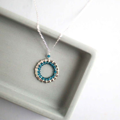 London Blue Quartz Halo Mini Silver PendantThe Halo collection was our very first one. Intended to symbolize the intricate, universal energy woven within us all. This beautiful necklace is ultra lightweight aNecklacesPARKEN JEWELRYVettedArcLondon Blue Quartz