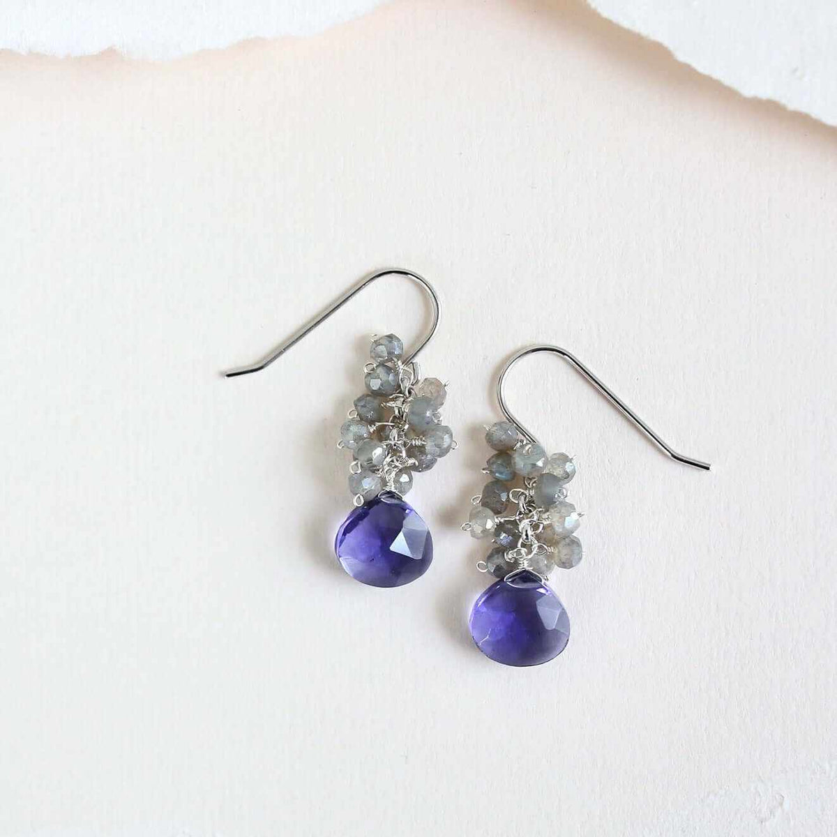 Tanzanite Quartz Silver Drop EarringsGemstone candy! Silver drop earrings with stunning tanzanite quartz gemstones topped with a gorgeous cluster of labradorite gems.
- 1.25" long- French hooks- RhodiumEarringsPARKEN JEWELRYVettedArcTanzanite Quartz Silver Drop Earrings